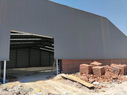 Low Cost Prefabricated Steel Workshop Building Wide Span Structural Steel Warehouse for Logistics Distribution Center